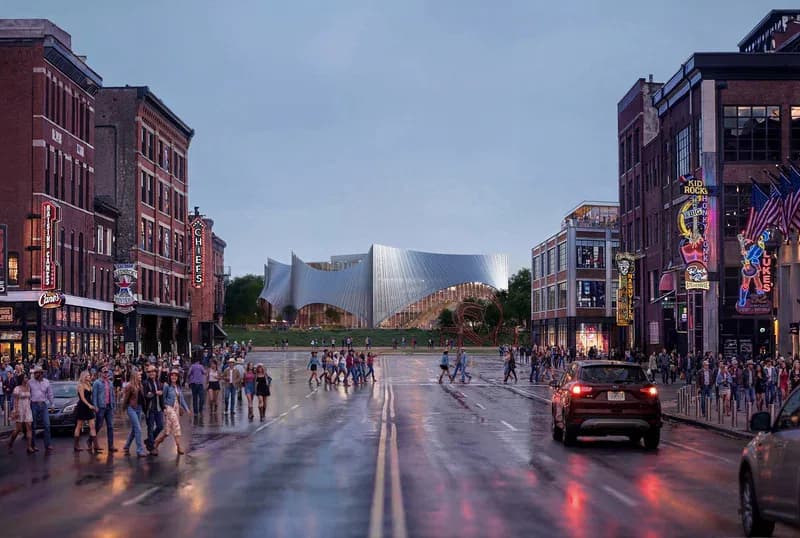 Urban plaza with wet pavement reflecting evening light, flanked by historic brick buildings and a modern metallic structure in the distance, by Bjarke Ingels.