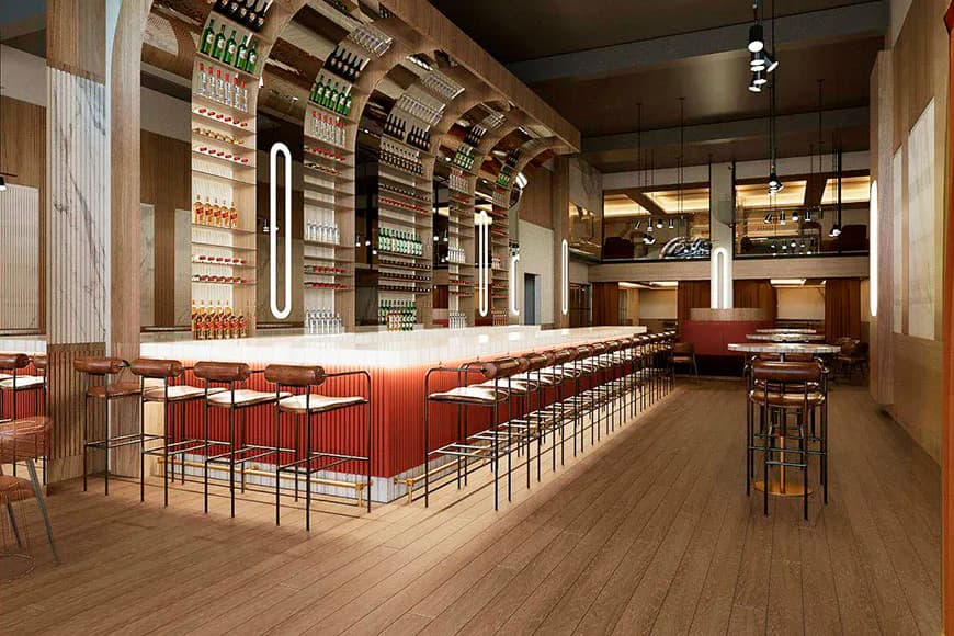 Modern wine bar interior with red curved counter, wooden flooring, extensive bottle shelving, and warm lighting design by Brianna Alves.