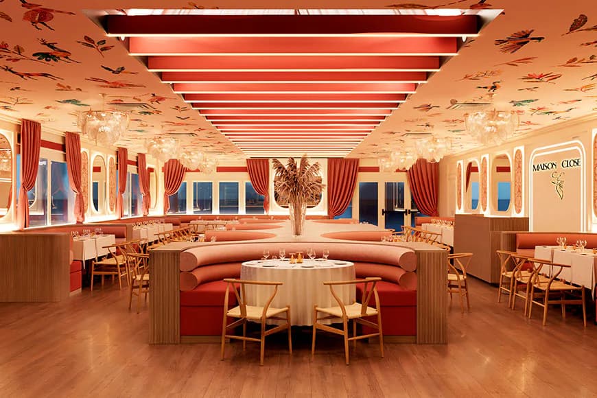 Art Deco-inspired dining space with curved banquettes, coral and cream palette, linear ceiling details, and symmetrical layout by Brianna Alves.