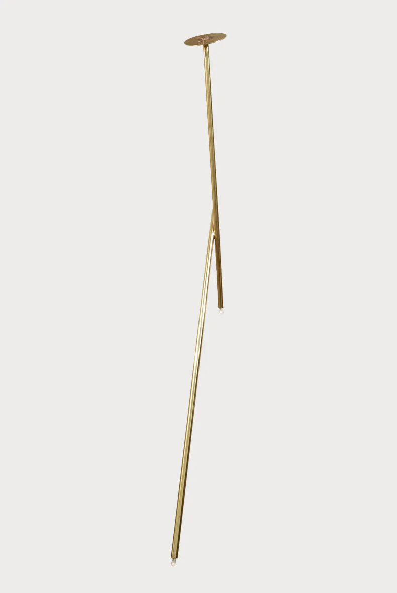 Brass ceiling-mounted sculptural light fixture with tapered linear form and small disk canopy by Cameron Crockford.