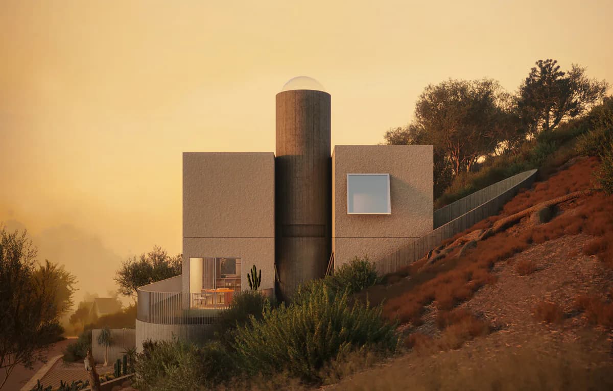 Modernist desert residence with cylindrical tower and geometric concrete volumes set against russet hillside at sunset, by Christopher Leong.