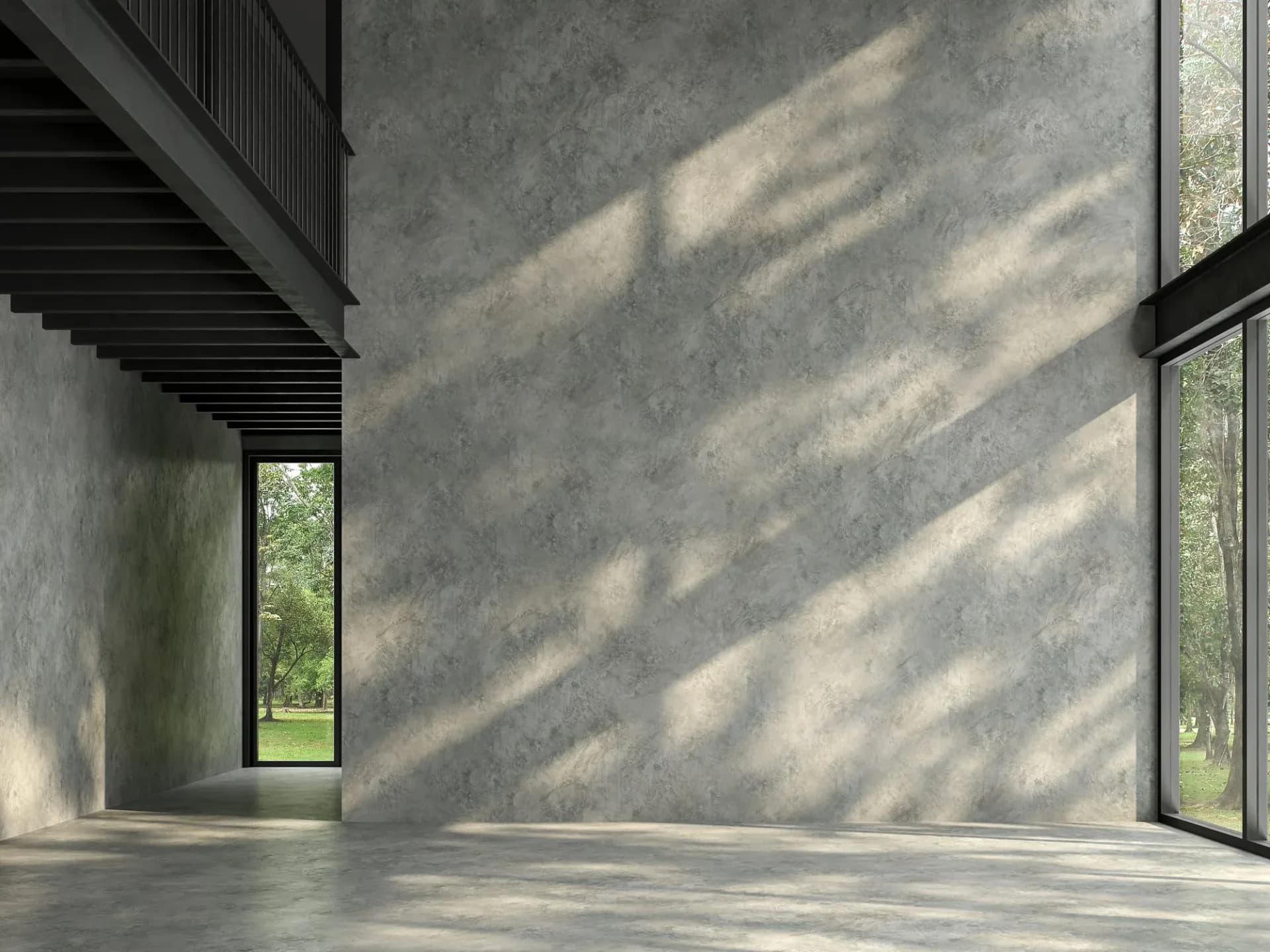 Minimalist concrete interior with floor-to-ceiling windows and dramatic shadow patterns, designed by Derrick Sibley.