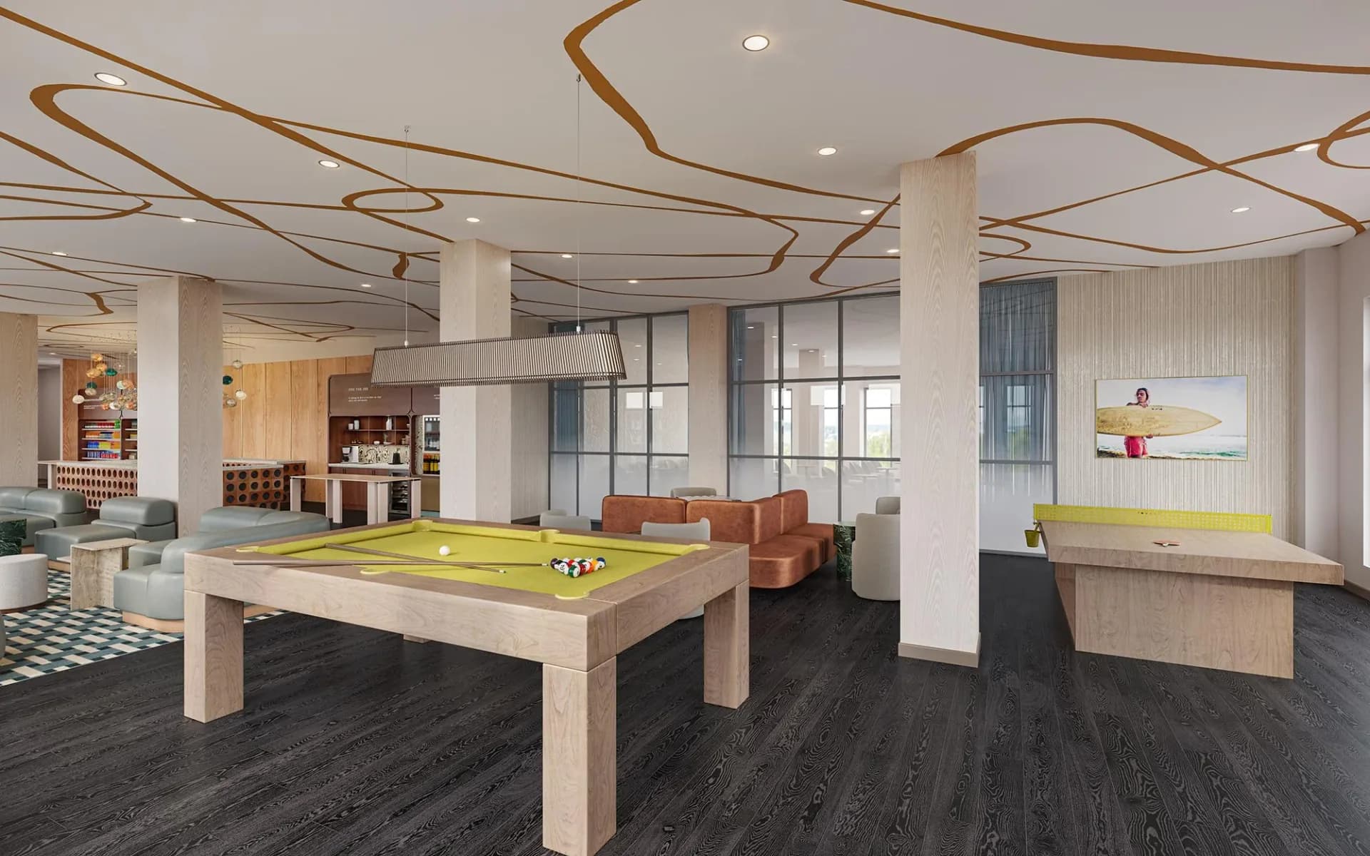 Modern office break room with light wood billiards table, geometric ceiling details, and bright yellow accent elements, designed by Erika Dray.