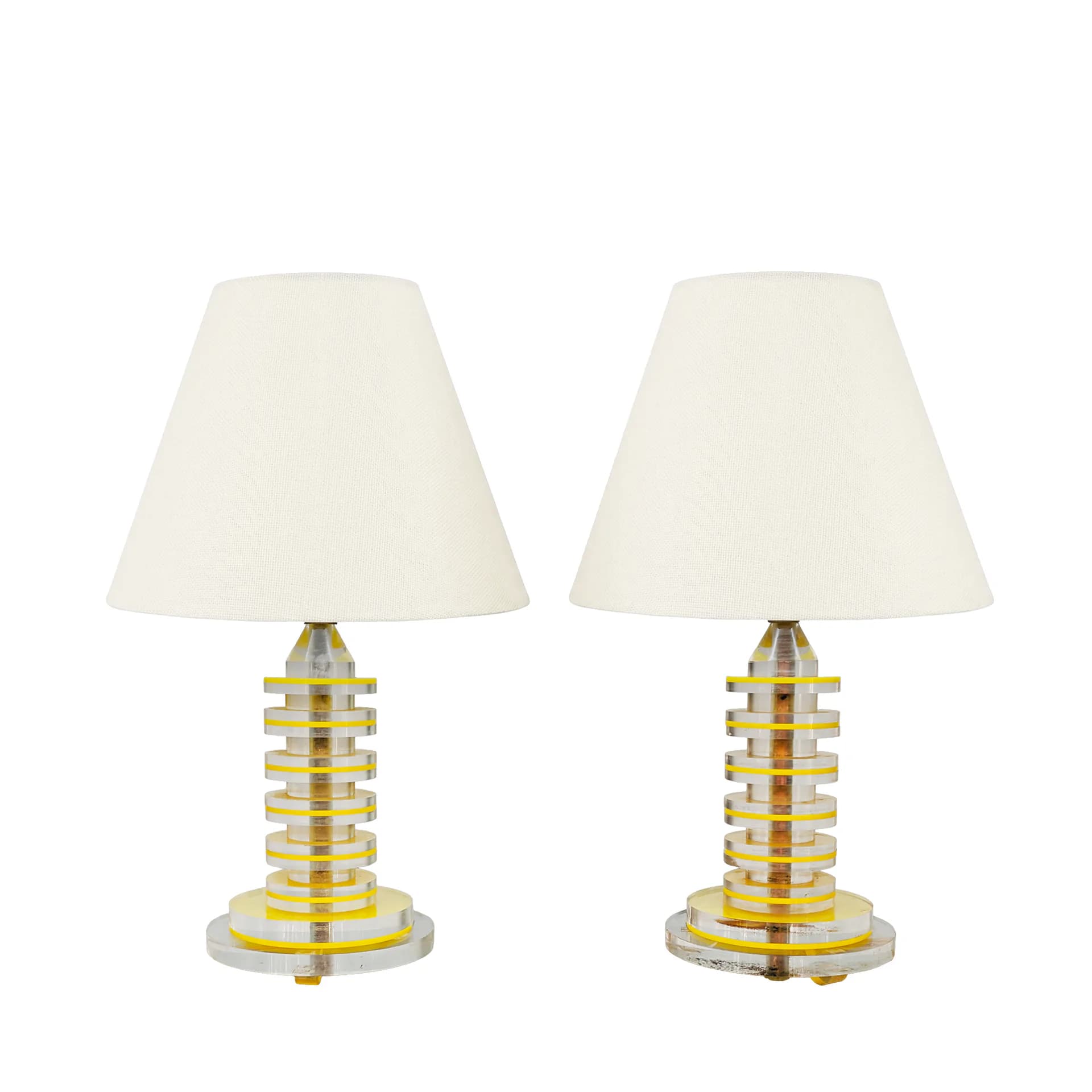 Pair of table lamps with stacked geometric brass and glass bases and cream linen shades, contemporary lighting design by Evan Ainbinder.