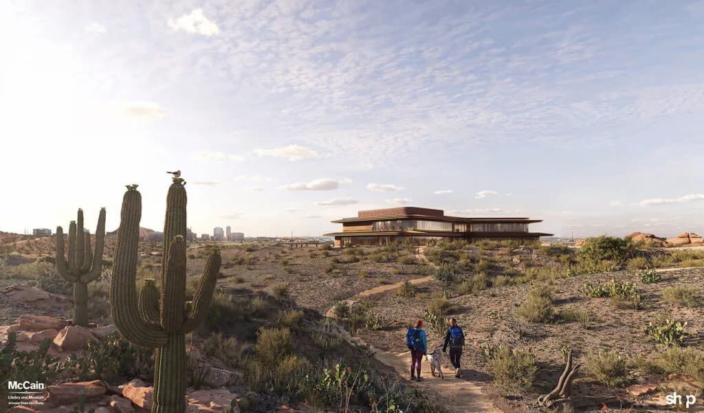 Desert landscape with saguaro cacti and a modernist structure featuring horizontal lines and earth tones, designed by Gregg Pasquarelli, with three figures in the foreground under a cloudy sky.