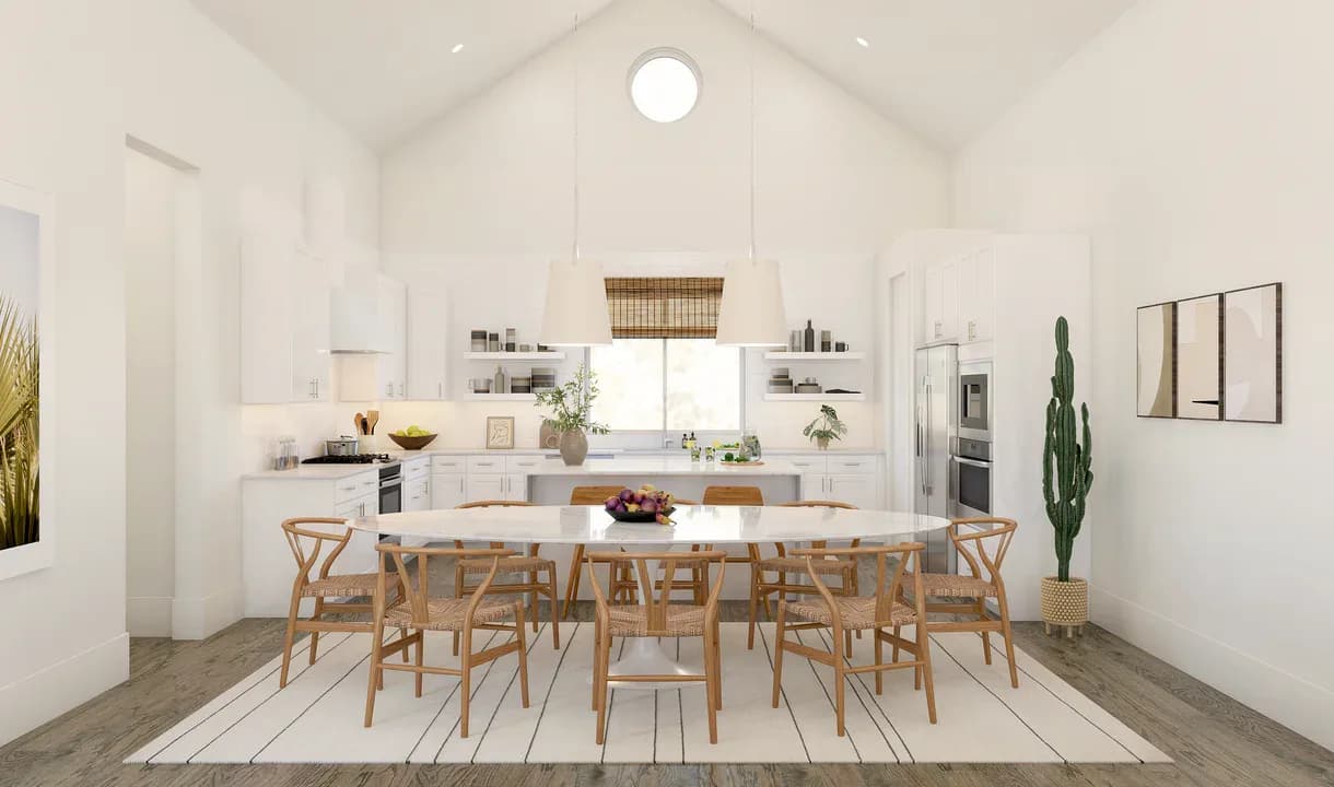 Bright modern kitchen-dining space with vaulted ceiling, natural wood dining table and chairs, white cabinetry, and minimalist décor by Jack Murphy.