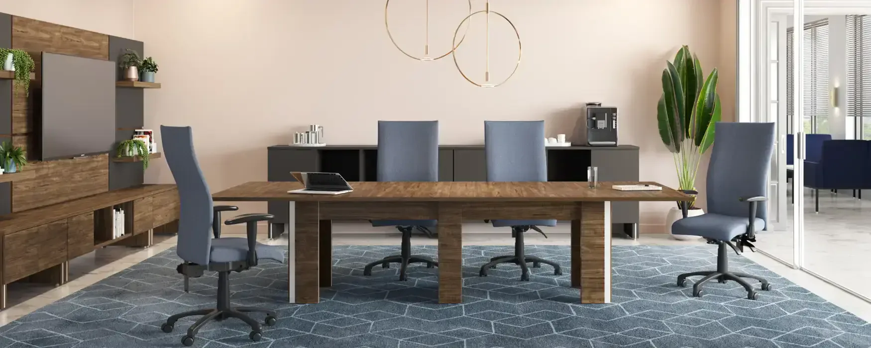Modern conference room with wooden table, blue upholstered chairs, wood paneling, and geometric wall art by Jerry Rock.