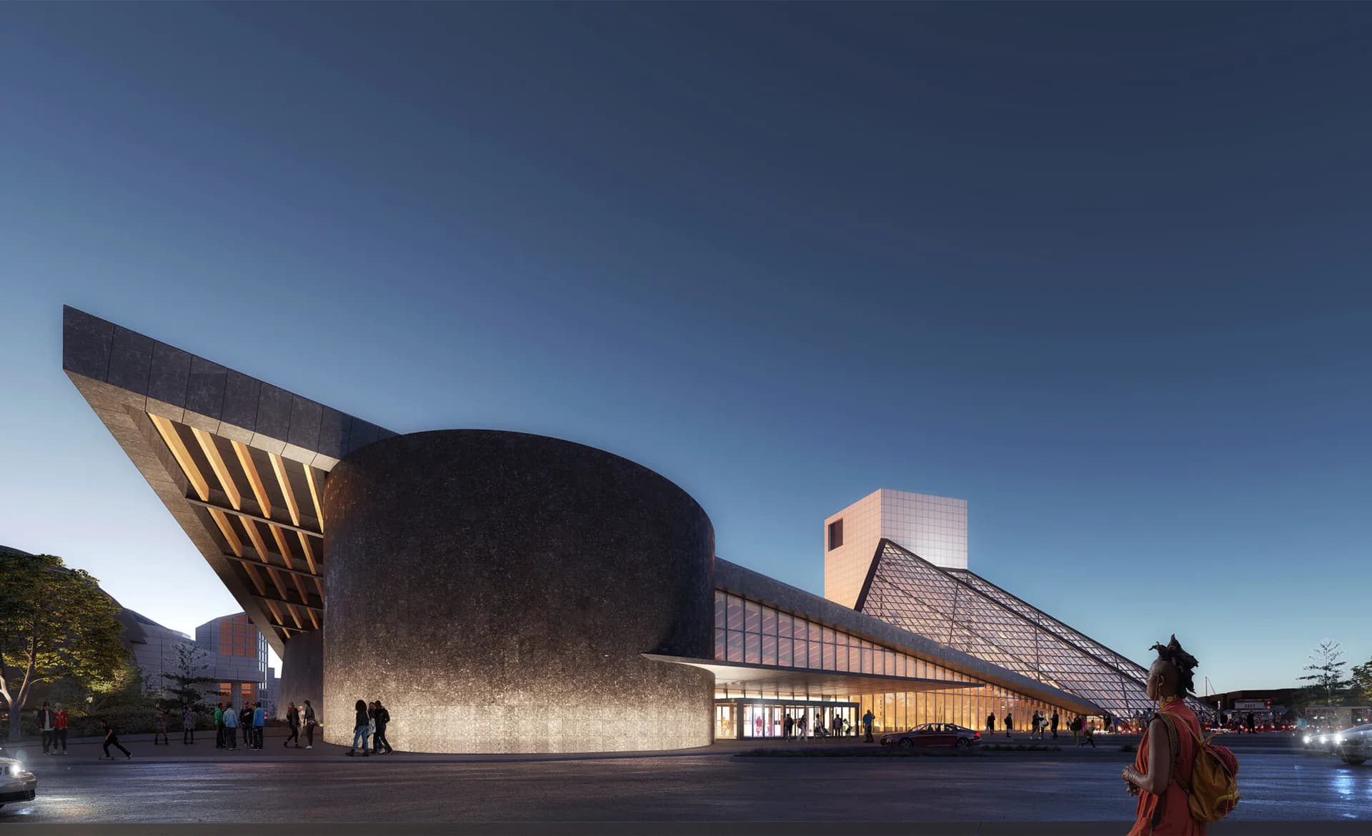 Illuminated modern architectural complex with curved cylindrical forms and angular wooden canopy structures set against evening sky, by Julia Lewis.