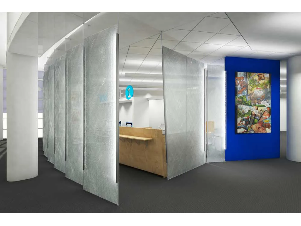 Modern office interior with translucent frosted glass partitions, warm wood reception desk, blue accent wall, and polished concrete floors, designed by Karen Lee.