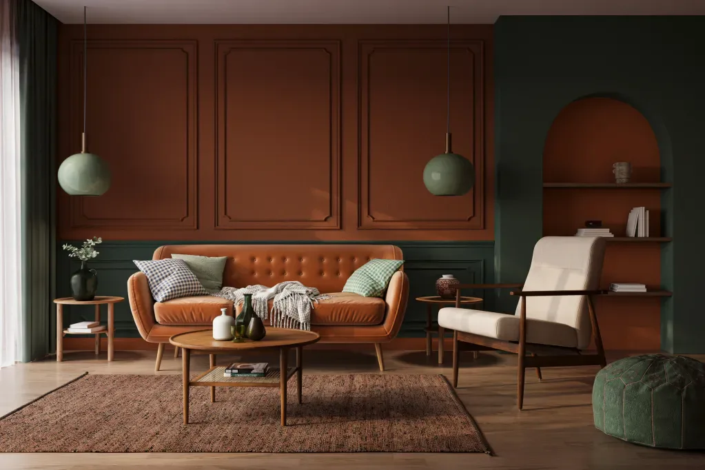 Terracotta and forest green living room with tufted sofa, mid-century furniture, arched niche, and warm wood tones, designed by Leah Bochner.