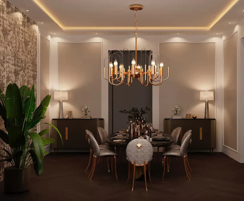 Modern dining room with dark wood table, taupe upholstered chairs, brass chandelier, and cream walls with indirect ceiling lighting by Lina Kreymerman.
