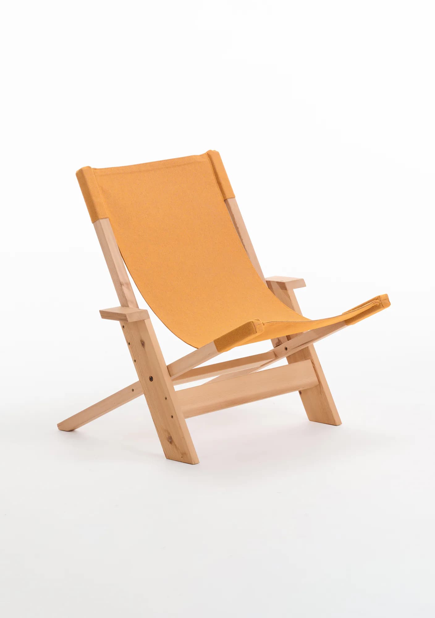 Orange fabric sling chair with natural wood frame, photographed against a white background, designed by Nicholas Baker.