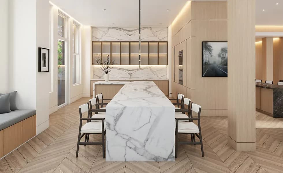 Modern bedroom with marble-topped island bed, built-in shelving, herringbone wood flooring, and neutral palette by Nitzan Tagansky.