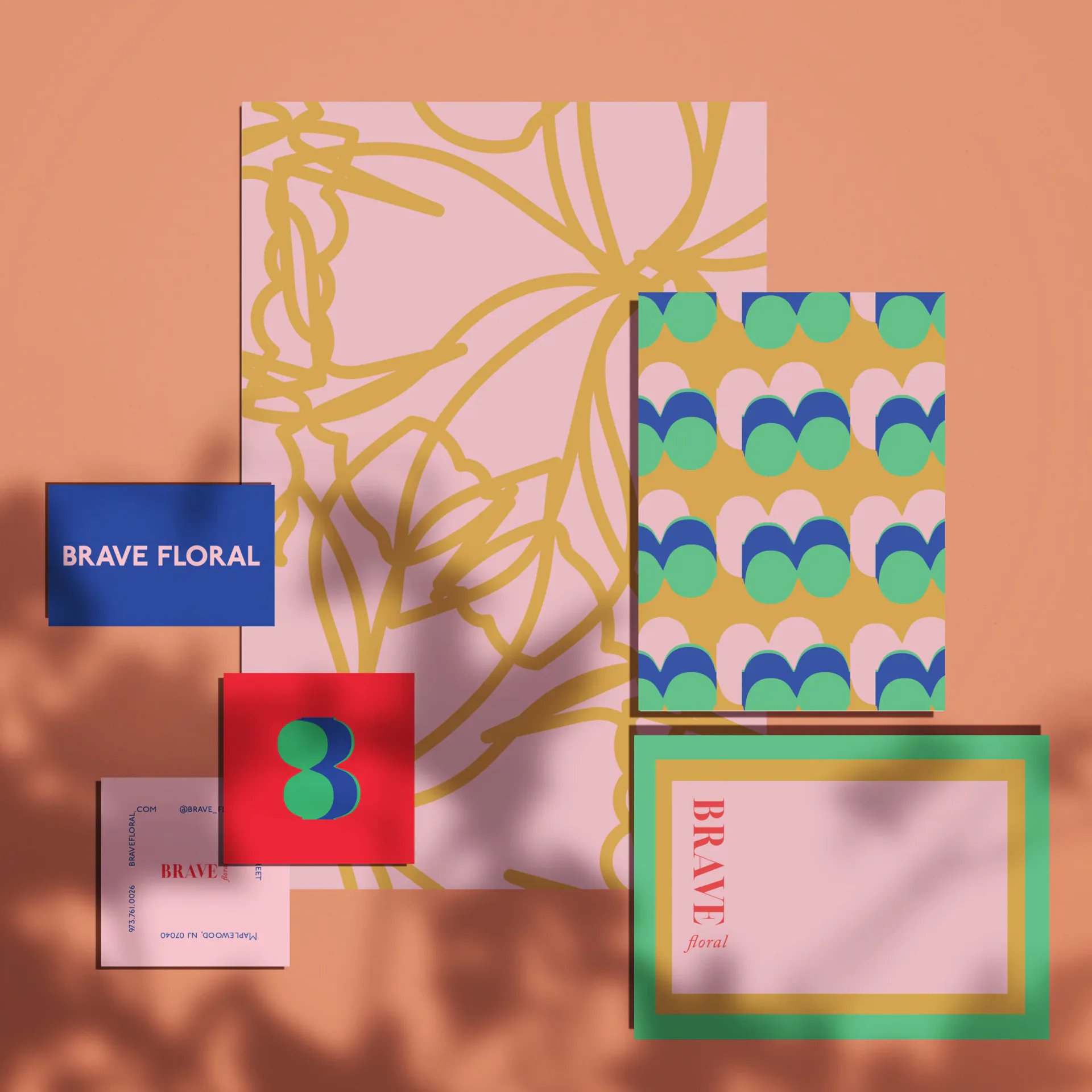Colorful branding materials displayed on a terracotta background, including floral patterns, geometric designs, and branded packaging by Rebecca Johnson.