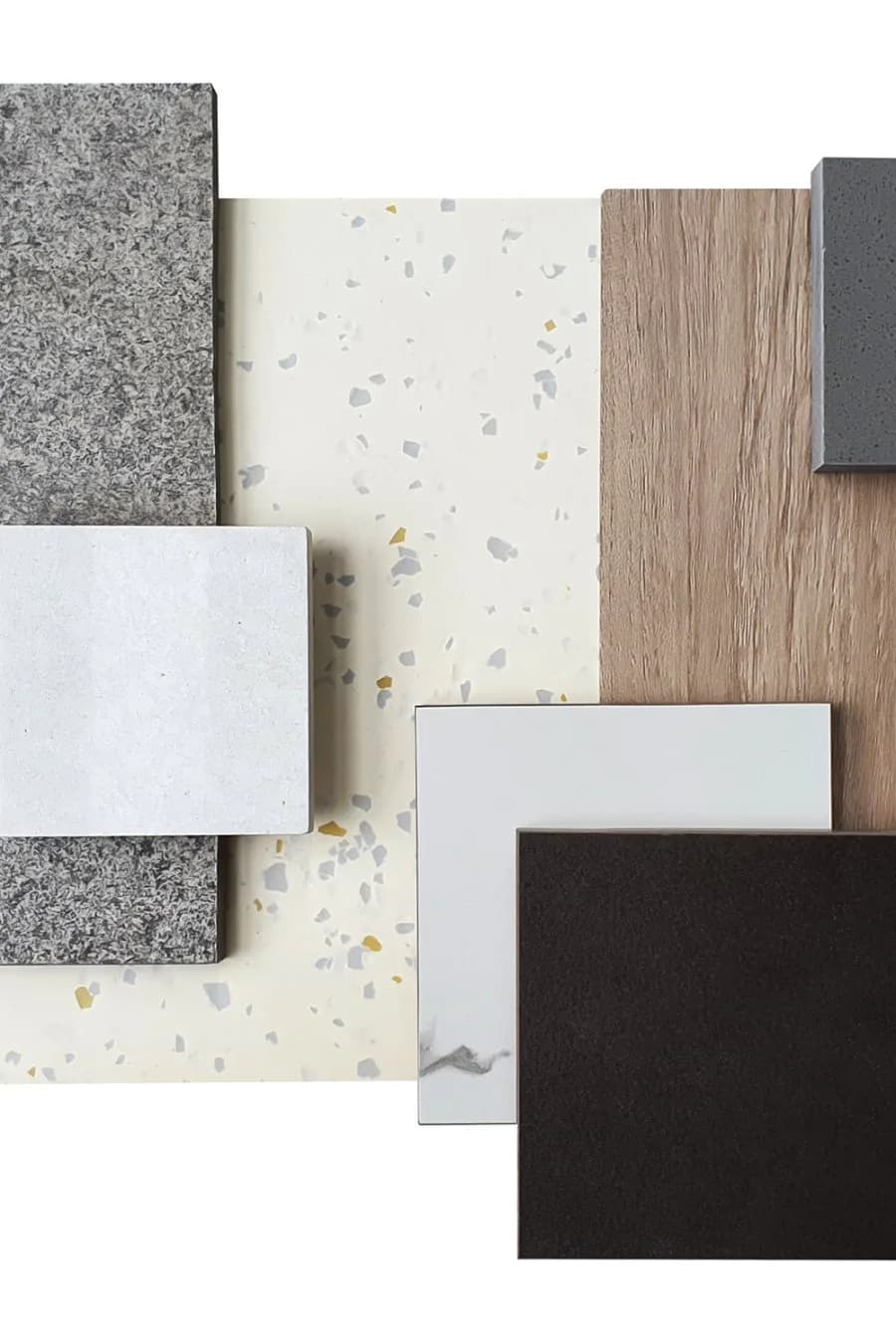 Material palette board displaying samples of granite, terrazzo, wood veneer, and solid surfaces in neutral tones by Remy Maurice.