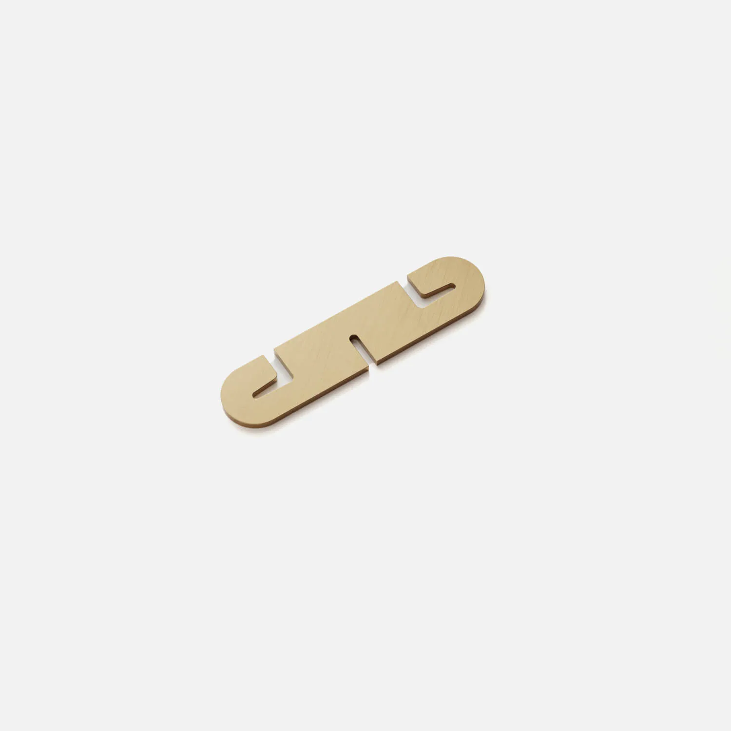 Wooden puzzle or sculptural object with interlocking segments in natural light wood tones, designed by Shant Madjarian.