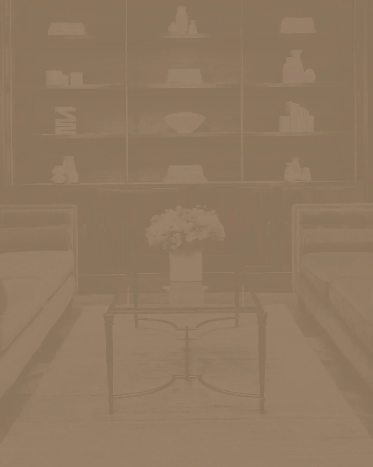 Warm-toned interior rendering of a residential space with furniture silhouettes, large windows with gridded panes, and architectural elements in muted beige tones by Stacey Gilles.