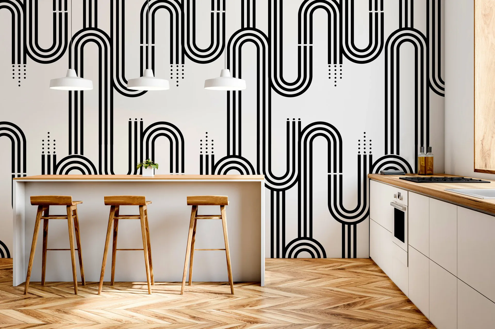 Modern kitchen with geometric black and white striped wallpaper, wooden bar stools, light wood herringbone flooring, and white cabinetry by Stephanie Eventov.