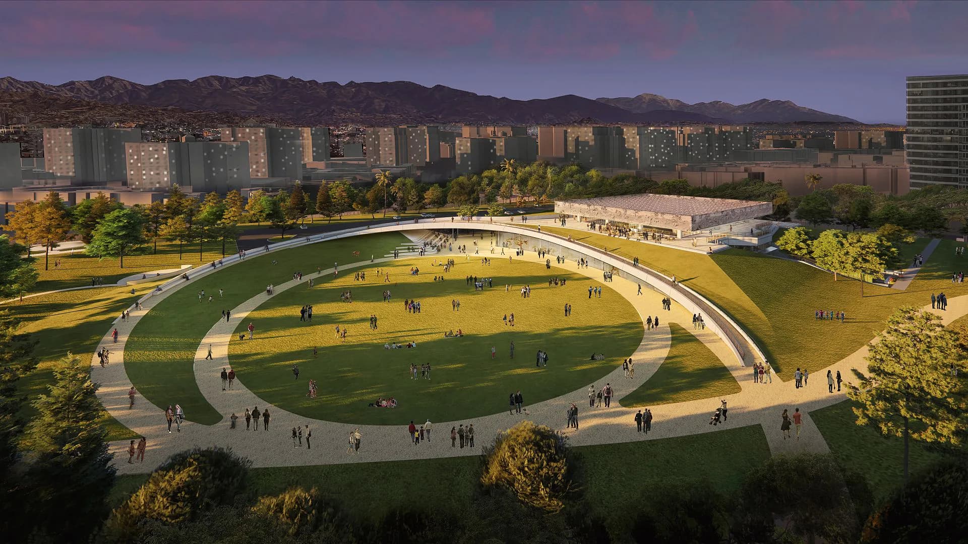 Aerial view of an oval stadium with yellow-green field, curved white seating structure, and surrounding park landscape against urban mountainous backdrop by Tomoko Akiba.