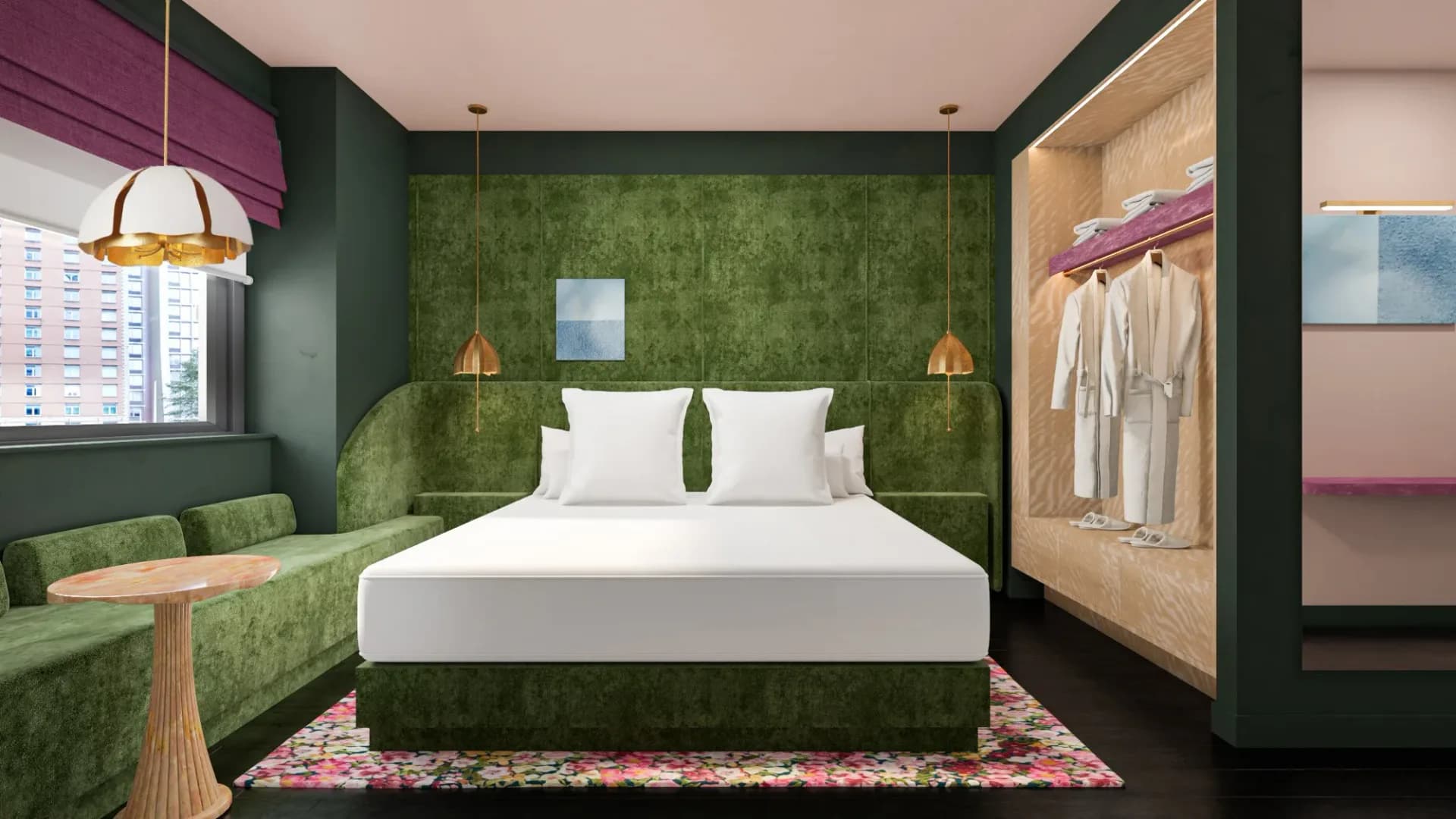 Modern hotel bedroom with forest-green textured walls, white bedding, brass pendant lights, wooden wardrobe, and pink floral area rug by Vanessa Watts.