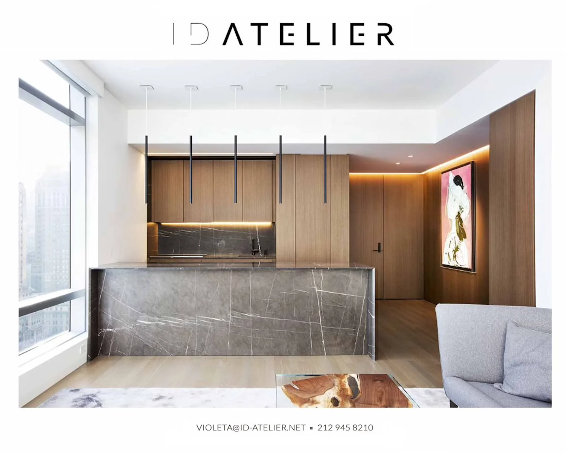 Modern kitchen and living area with warm wood cabinetry, gray marble island, pendant lighting, and minimalist finishes designed by Violeta Lekutanoy.