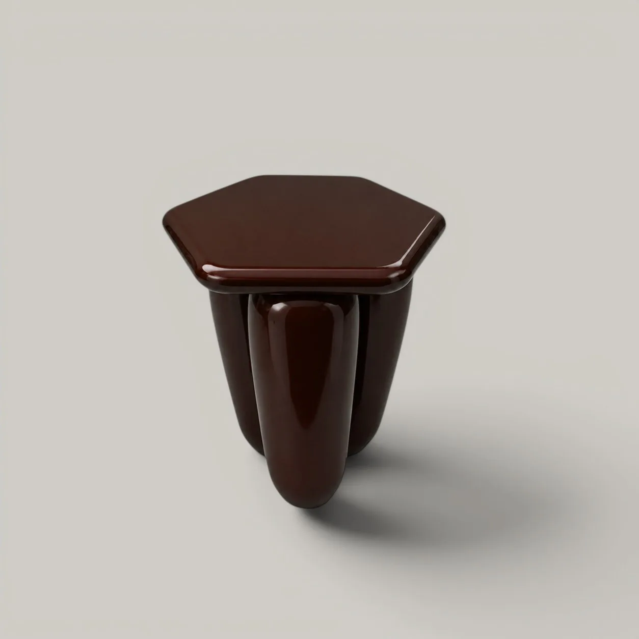 Dark brown glossy sculptural object with organic curved forms and a flat top surface, rendered with smooth reflective materials and dramatic shadow, by Alter Ego Studio.