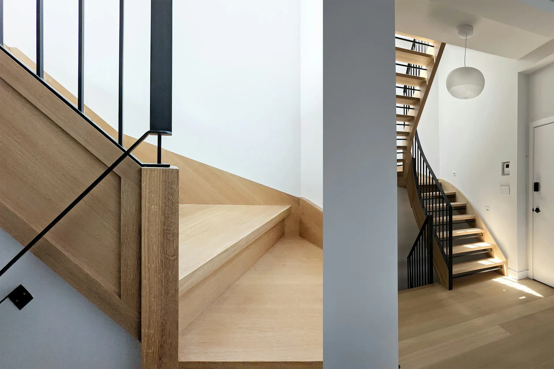 Modern residential staircase with light wood treads, black metal railings, and white walls, featuring natural light from upper windows, designed by AMMOR Architecture LLP.