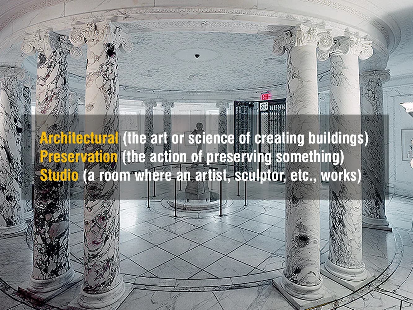 Neoclassical interior with marble columns, geometric floor pattern, and bright blue ceiling, preserved by Architectural Preservation Studio.