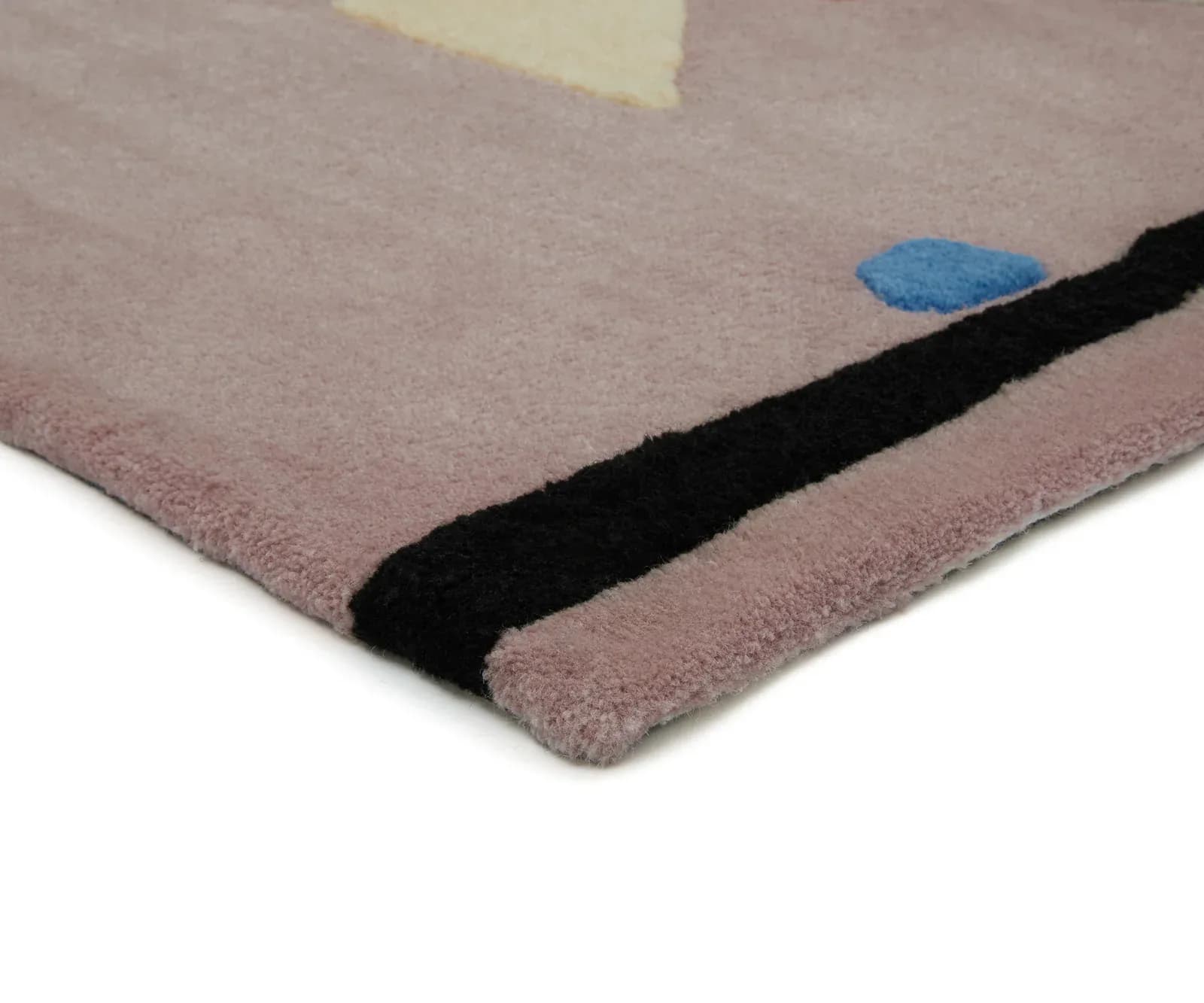 Minimalist wool rug in mauve and black with blue and cream accents, featuring geometric color blocking by Cold Picnic.