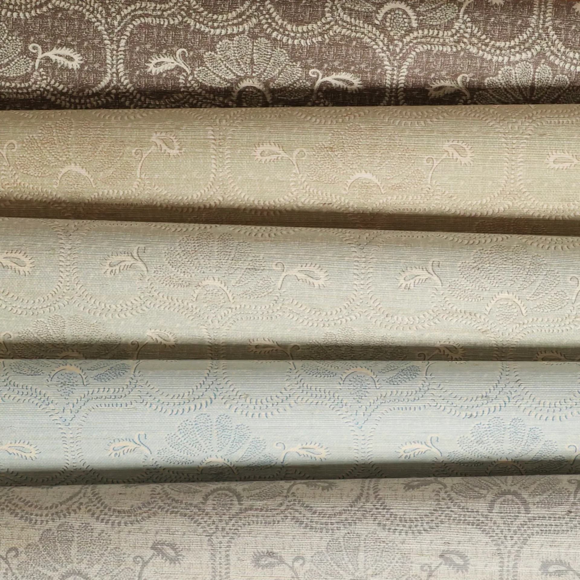 Five fabric swatches displayed in horizontal rows showing neutral-toned damask and botanical patterns in cream, beige, and taupe by Elizabeth Eakins.