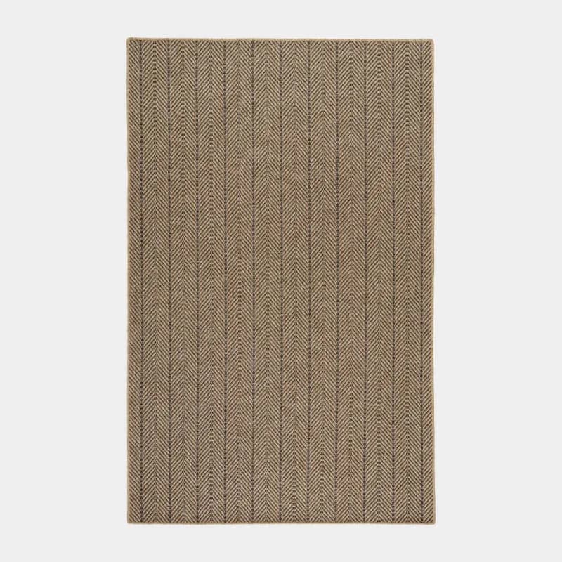 Neutral-toned textile or wall surface with subtle vertical ribbed pattern and woven texture detail by Ernesta.