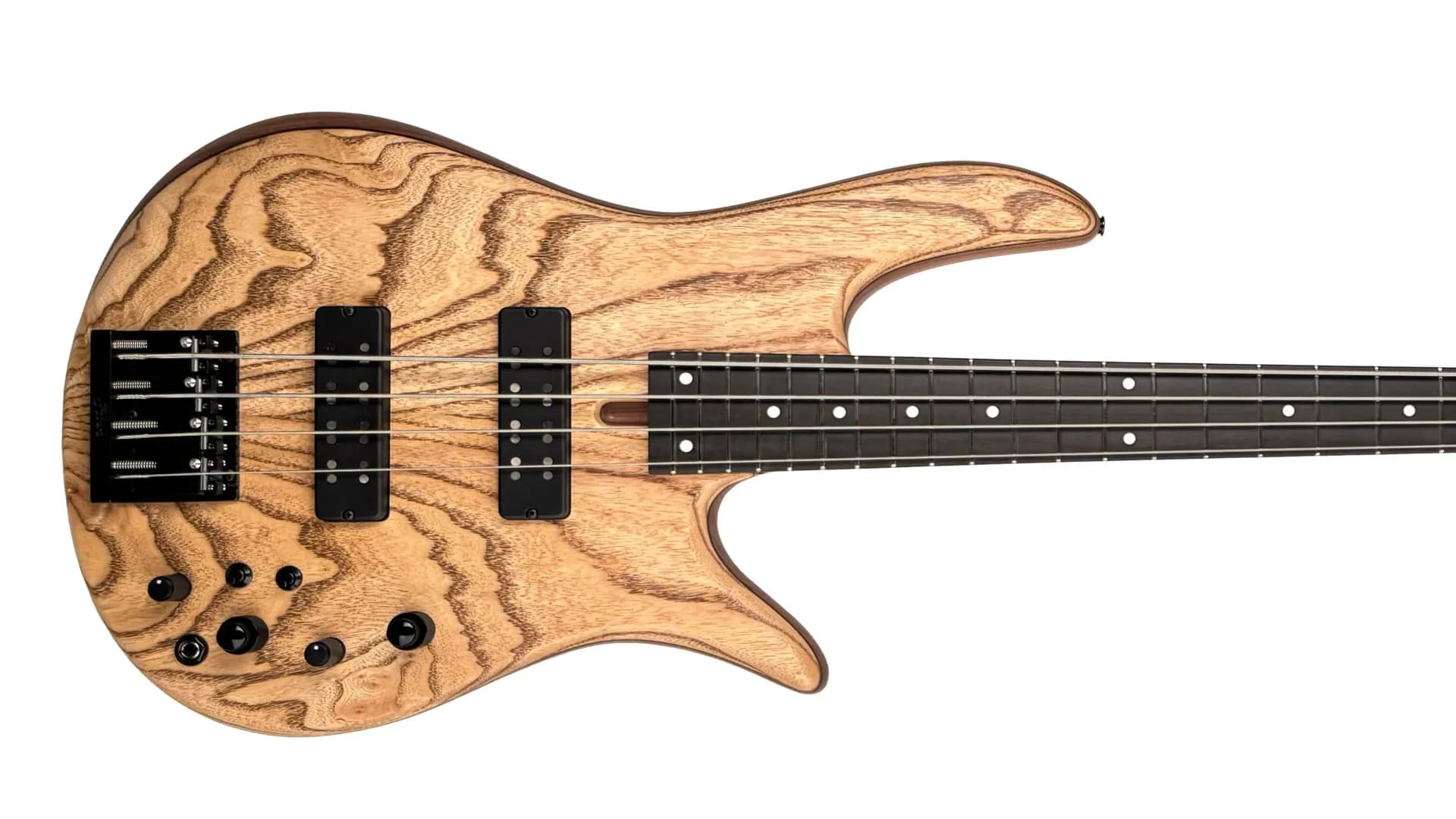 Wooden bass guitar with figured wood body and black hardware photographed against white background by Fodera Guitars.