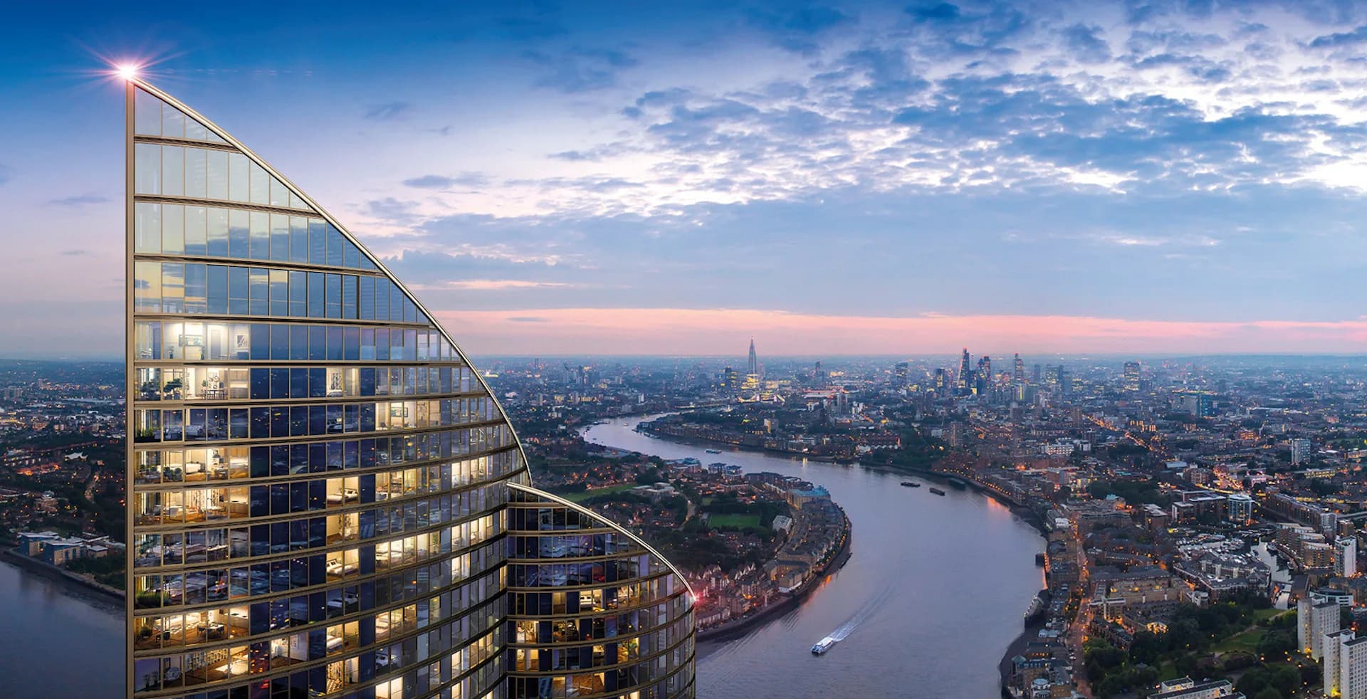 Illuminated residential tower with triangular glass facade overlooking a river and cityscape at dusk, designed by HOK.