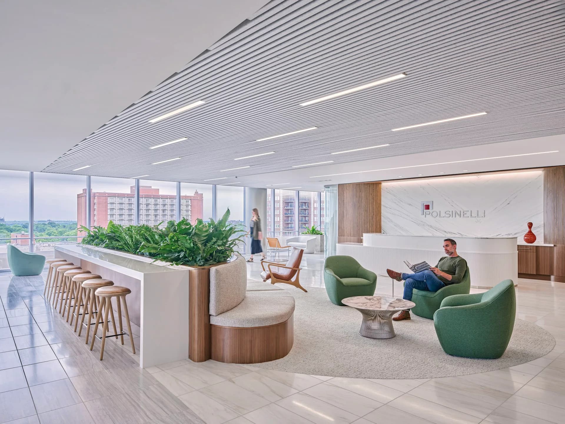 Modern office lounge with green seating, wooden planters, linear ceiling details, and city views, designed by HOK.
