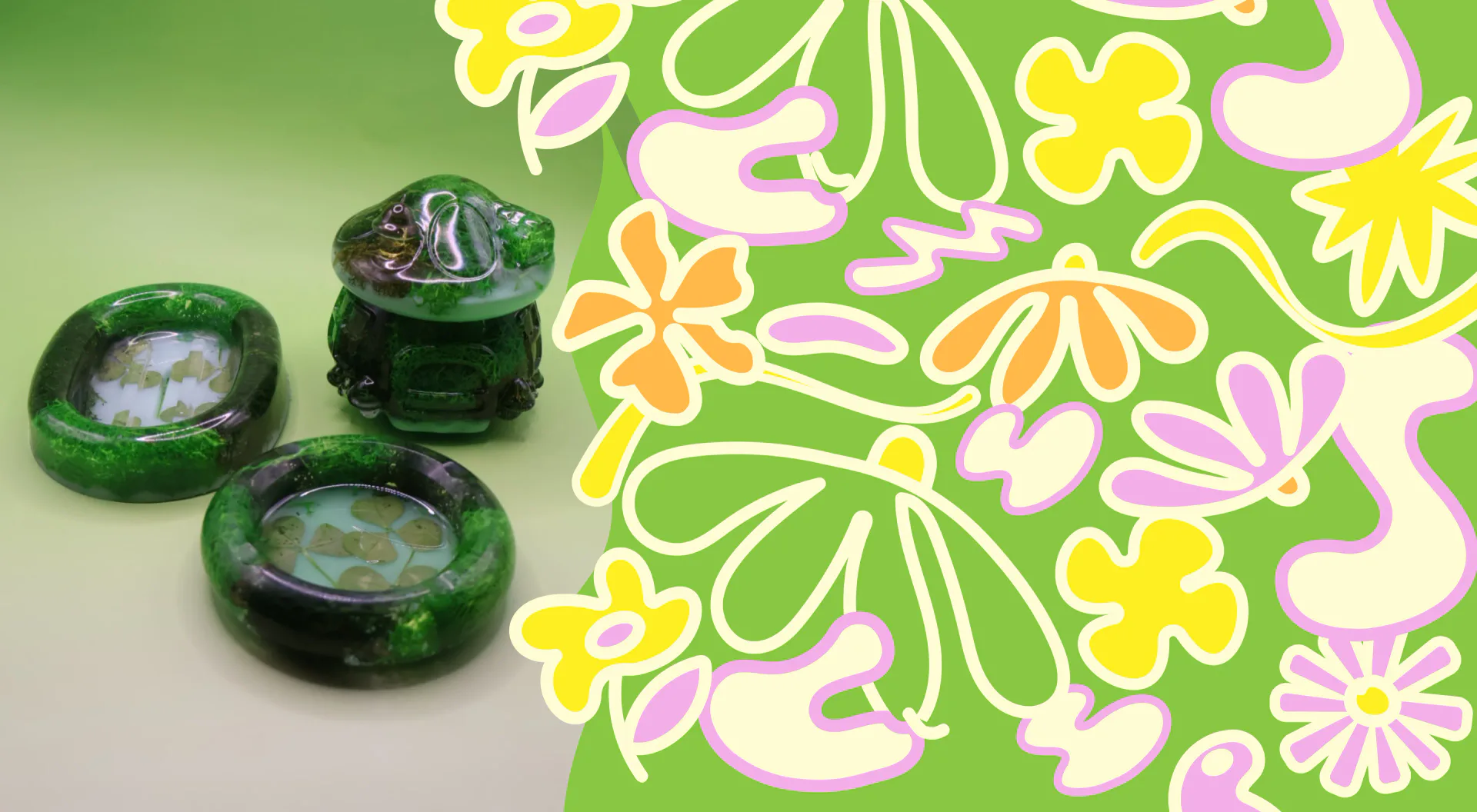 Green glass decorative objects displayed against a vibrant green and white floral pattern surface by IRUSU Creation.