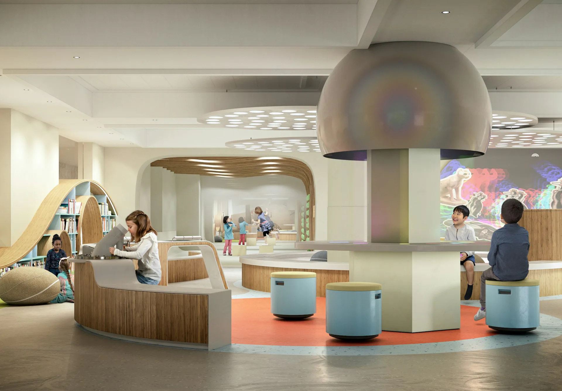 Modern children's healthcare center interior with curved dome ceiling, wooden reception desk, colorful floor poufs, and playful spatial design by Koko Architecture + Design.