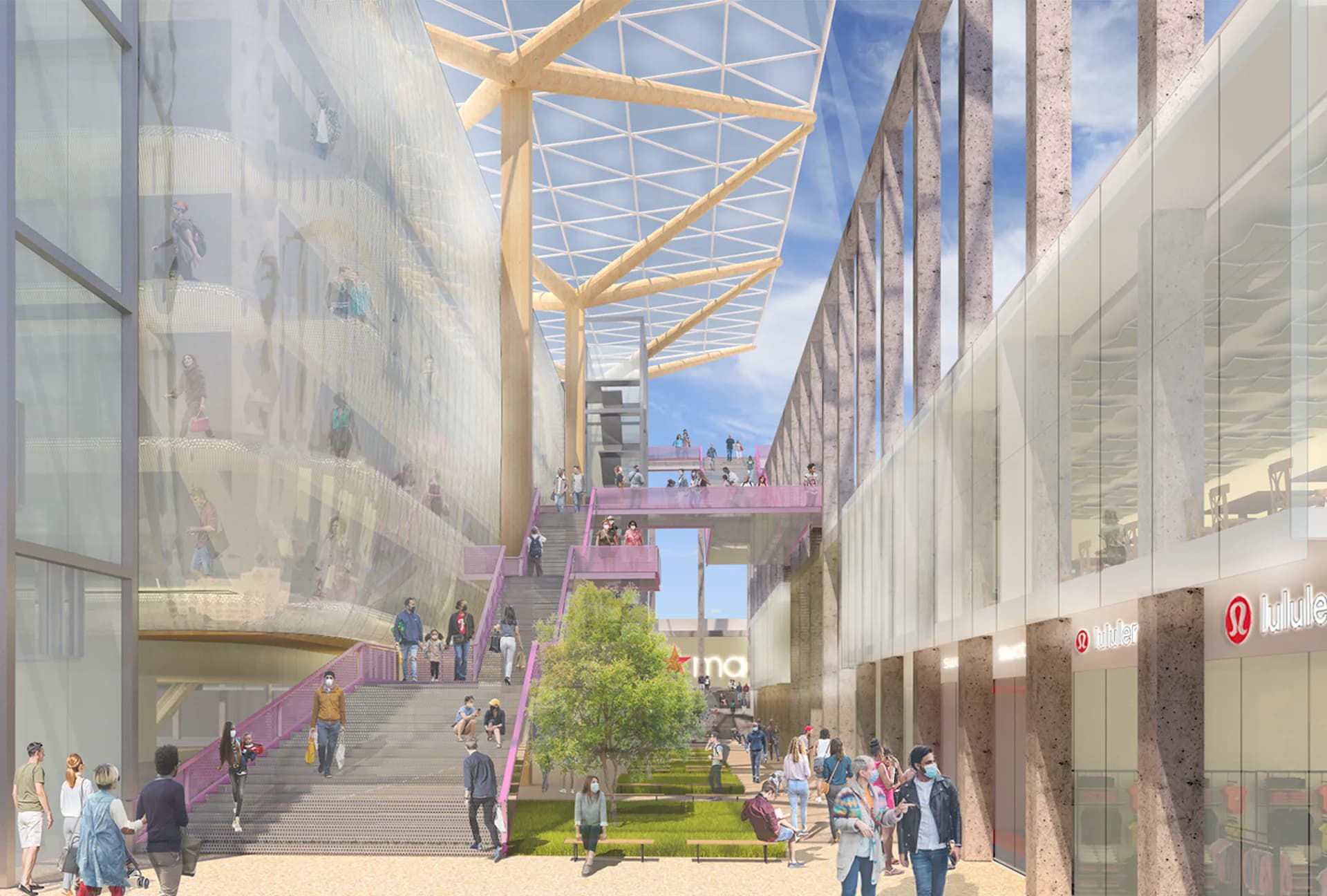 Bright modern atrium with yellow steel framework, glass walls, and planted green spaces featuring numerous pedestrians, designed by Kostow Greenwood Architects.