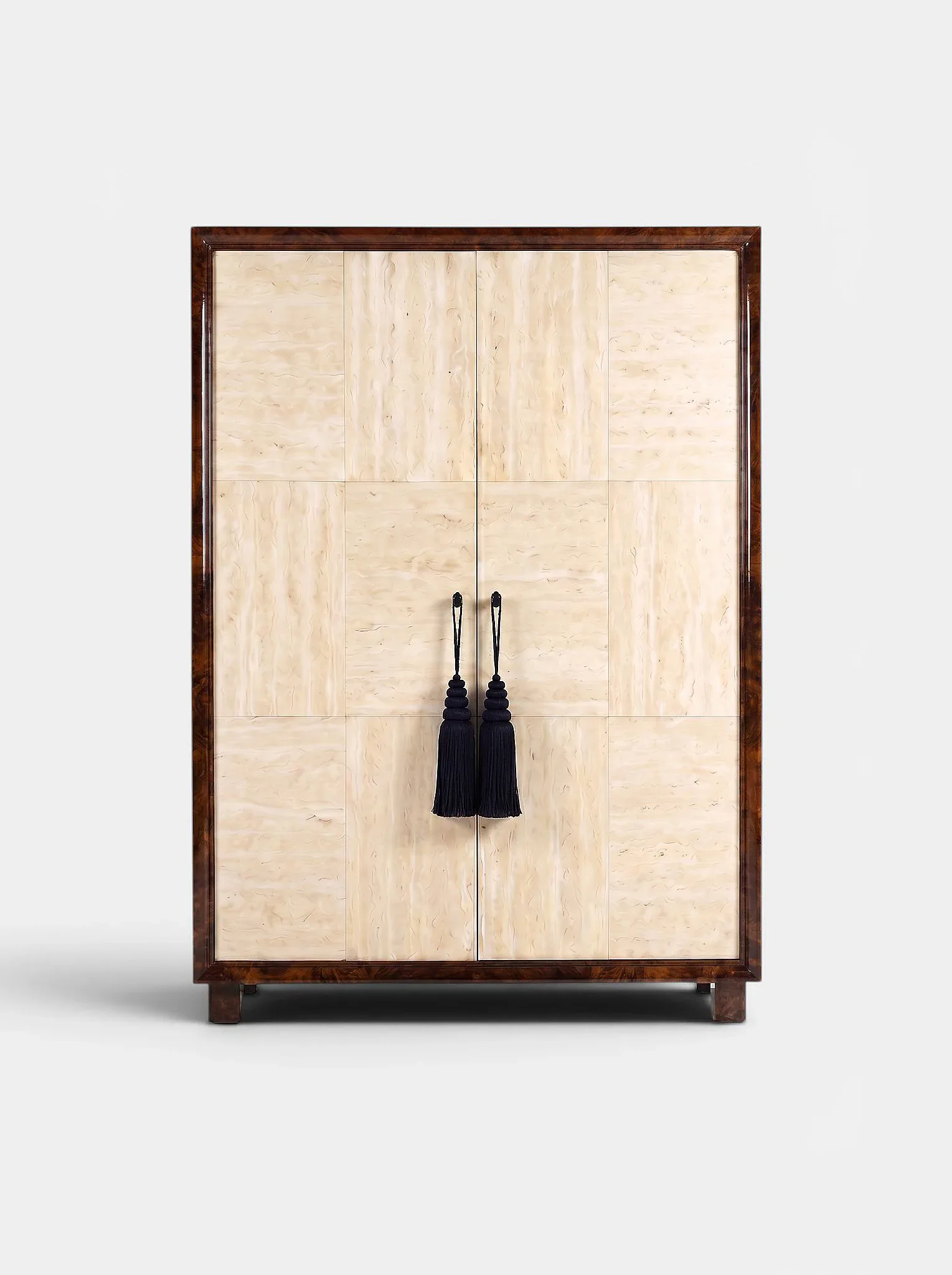Tall wooden wardrobe with dark brown frame and light wood panel doors featuring black tassel handles, designed by Marbera.