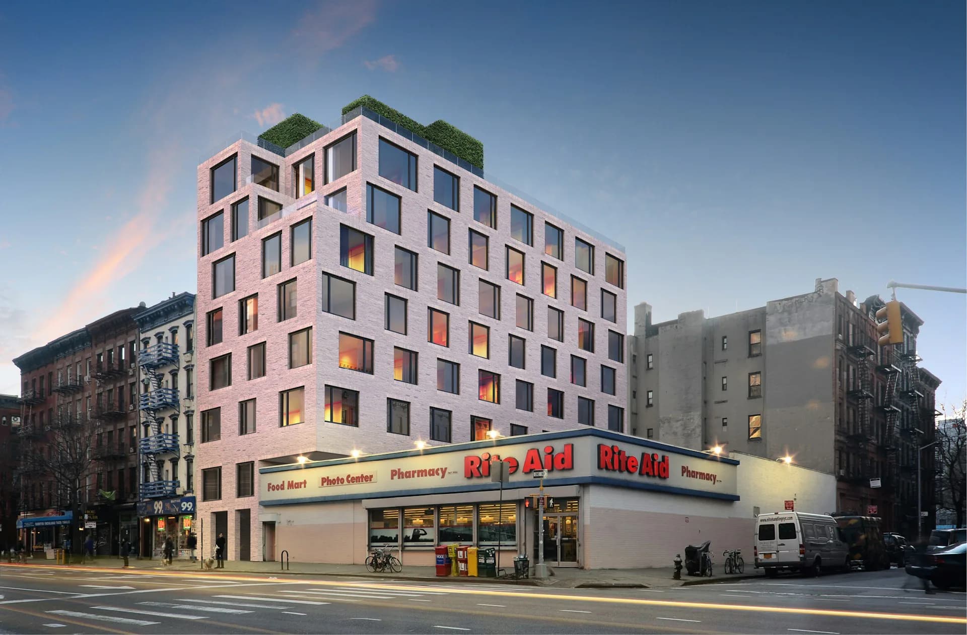 Mixed-use building with cream and pink facade, green rooftop terraces, and ground-floor retail, designed by NO ARCHITECTURE.