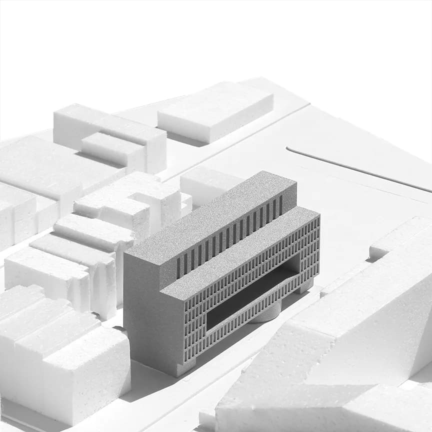 Architectural model of a modernist building with gridded facade and stepped massing, rendered in white and gray tones by Only If.