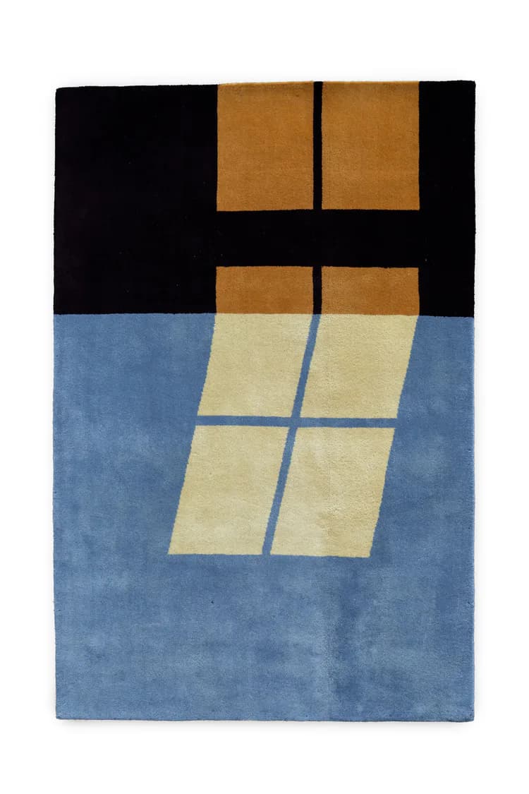 Abstract geometric composition featuring a black upper section with tan rectangular forms, and blue lower section with pale yellow grid-like shapes by Ridezign.