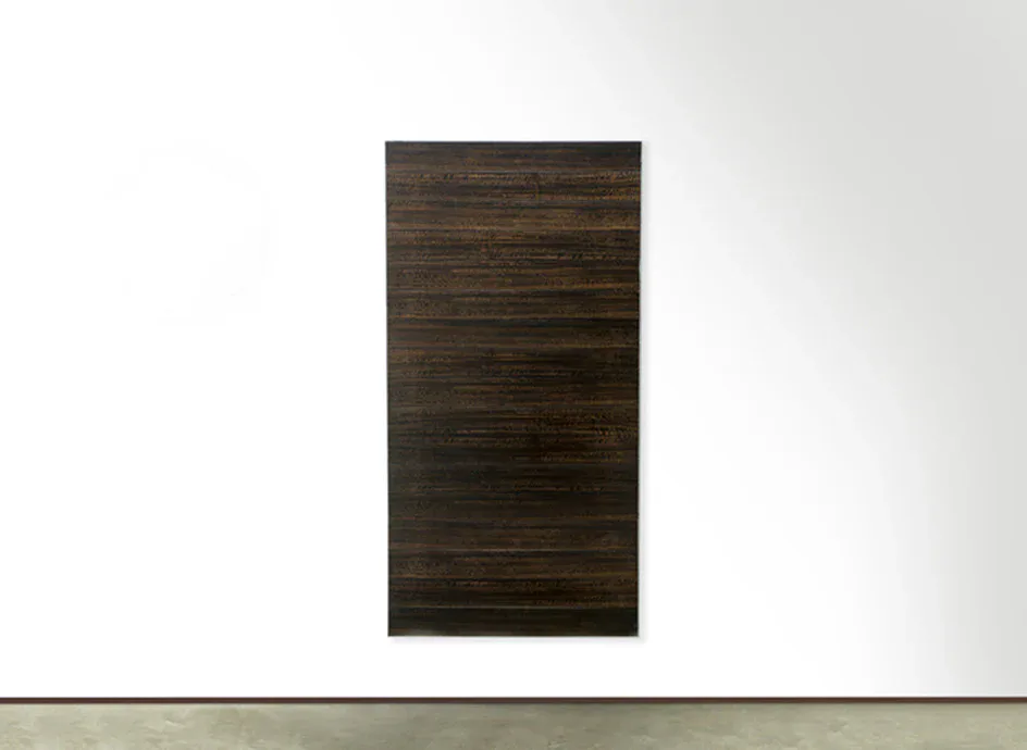 Minimalist interior with a dark horizontal wood-slat wall panel mounted above a light concrete floor against white walls by RockPaperRobot.
