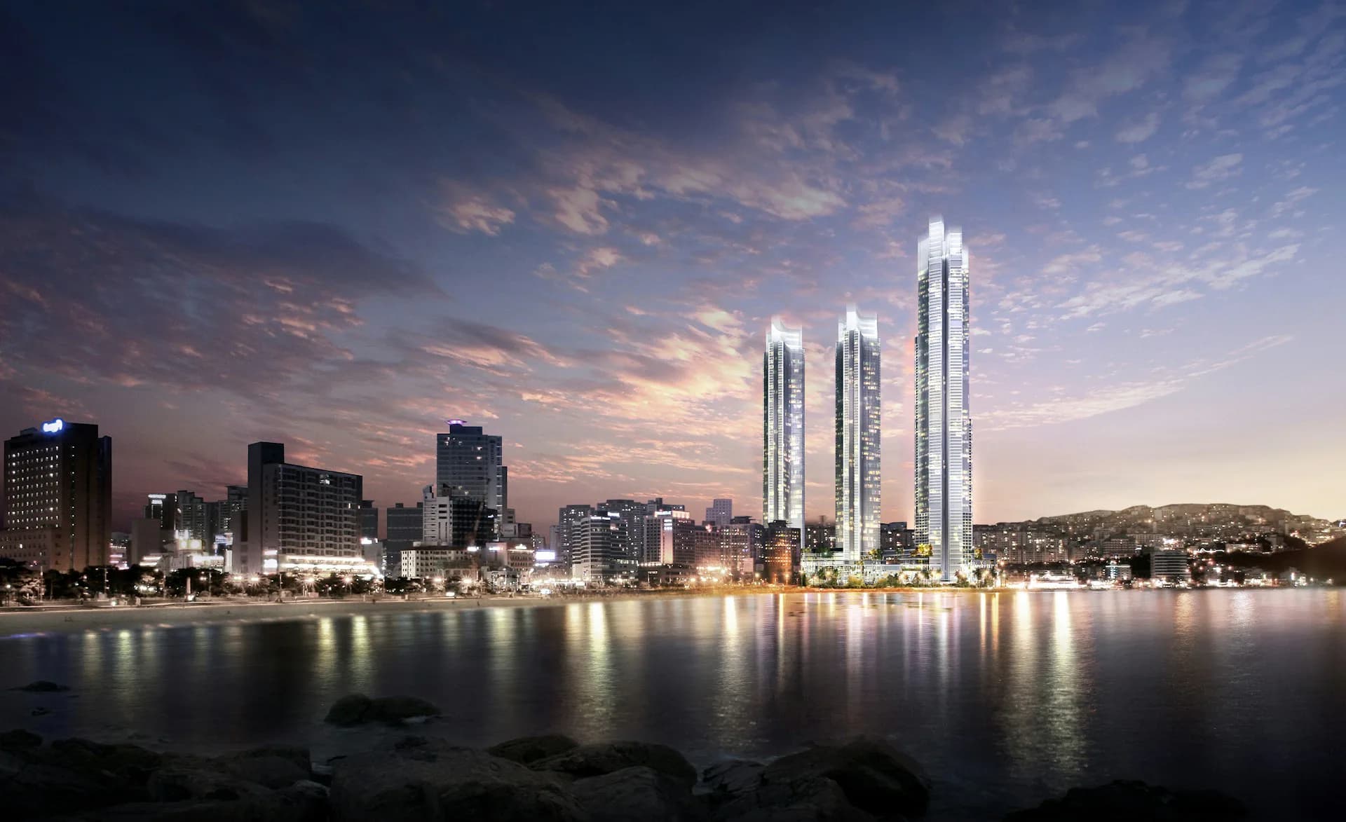 Waterfront high-rise towers illuminated at dusk with reflections in calm water, featuring three slender white buildings against a purple sunset sky by SAMOO Architecture PC.