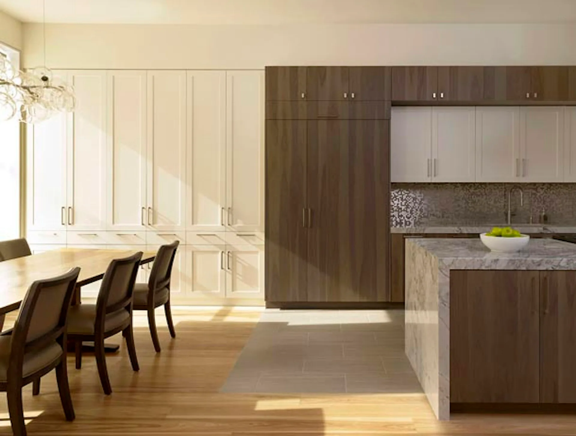 Modern kitchen and dining space with cream cabinetry, dark wood accents, marble countertop, and warm wood flooring, designed by SPG Architects.