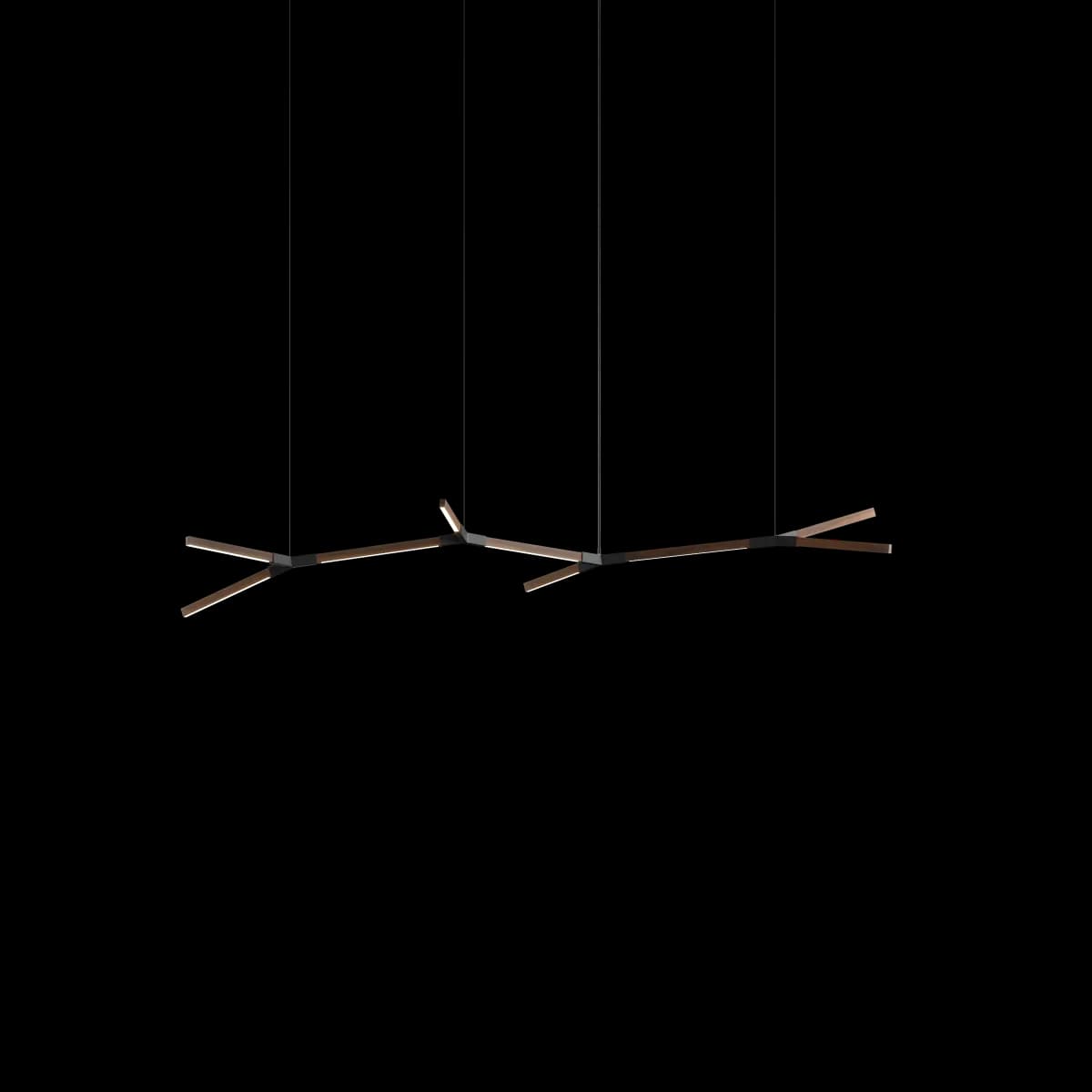 Branch-form pendant lighting fixture with bronze elements and suspended wires against white background by Stickbulb.