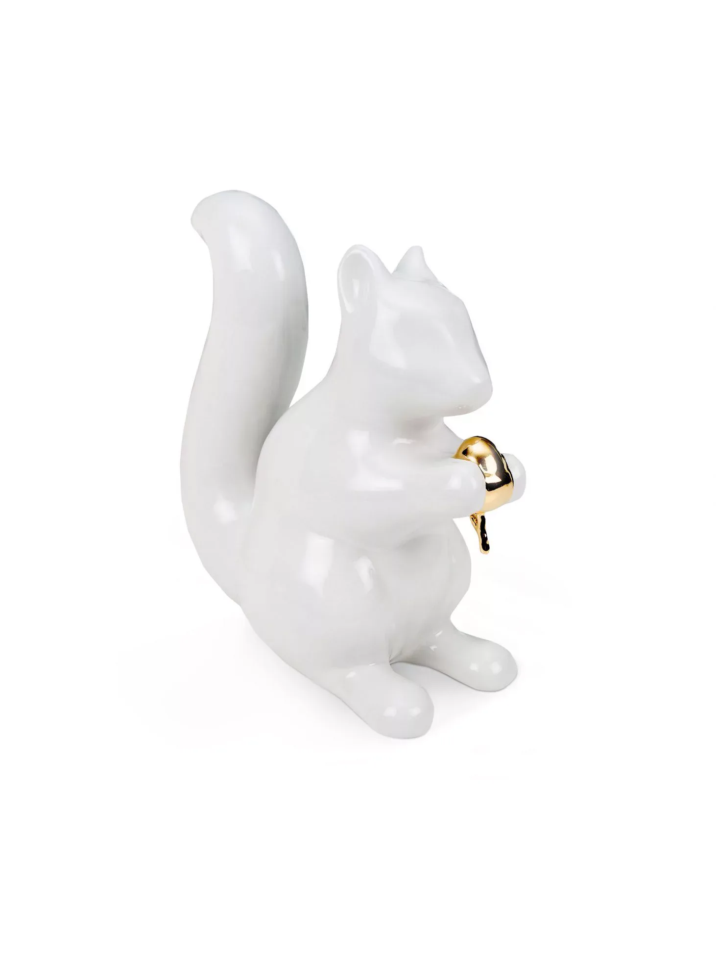White ceramic squirrel figurine with gold-painted acorn detail, sculptural tabletop object by Studio Job.