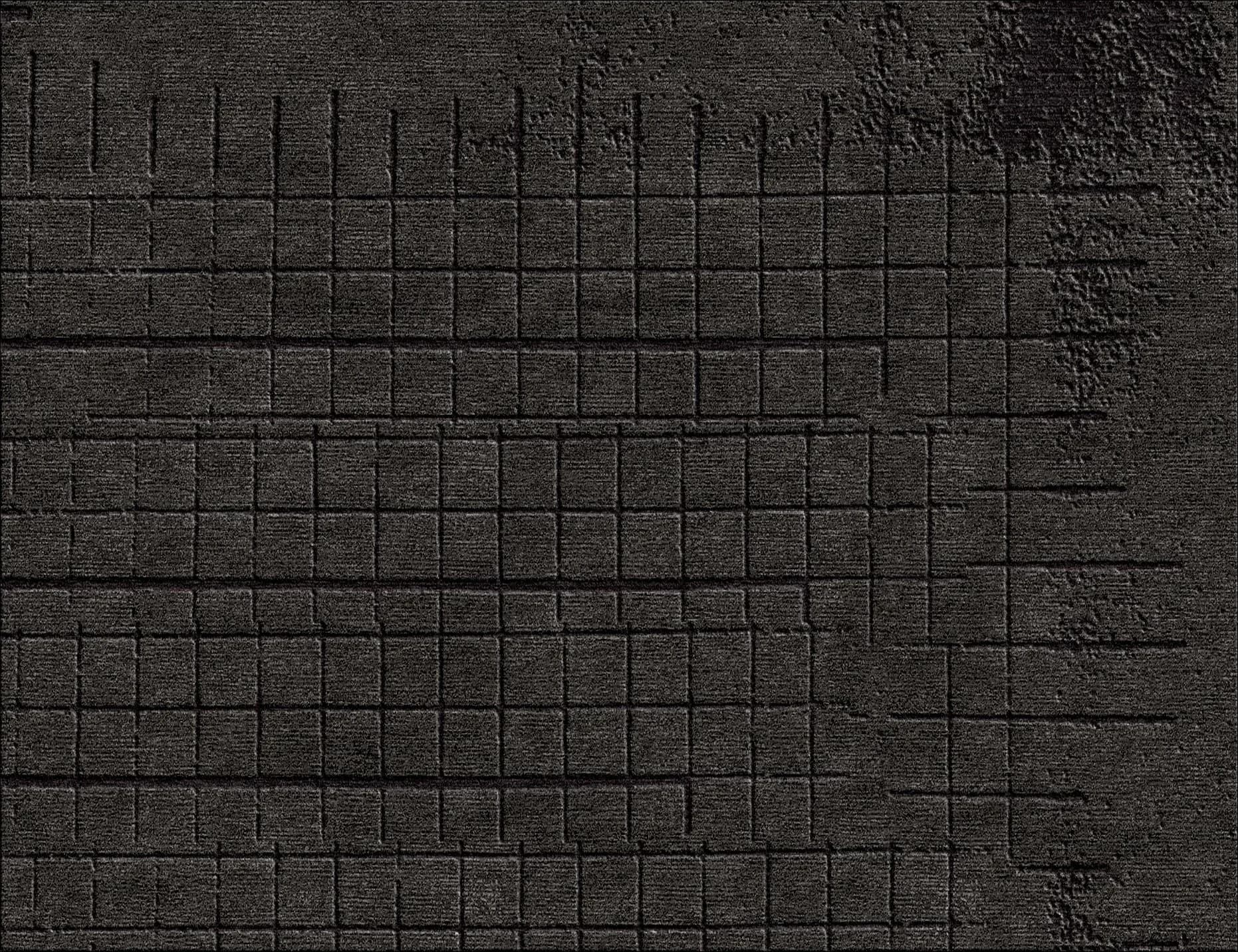 Dark charcoal tile flooring with a geometric grid pattern and textured surface creates a sophisticated, modern aesthetic by Temple Rugs.
