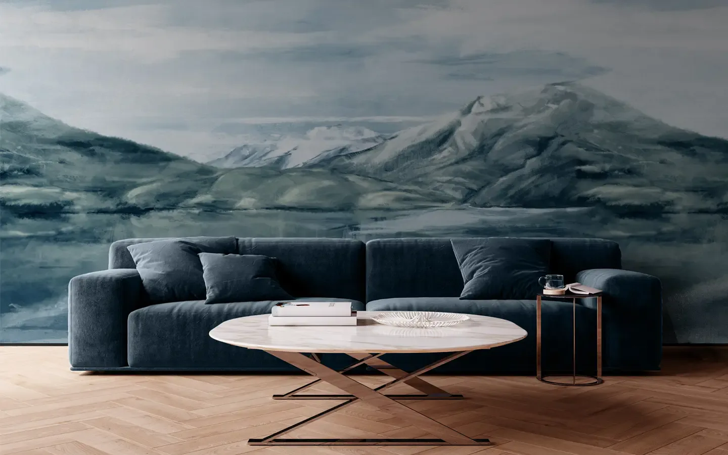 Modern living room with charcoal curved sofa, white oval coffee table, and dramatic mountain landscape mural wall by Wolf-Gordon.